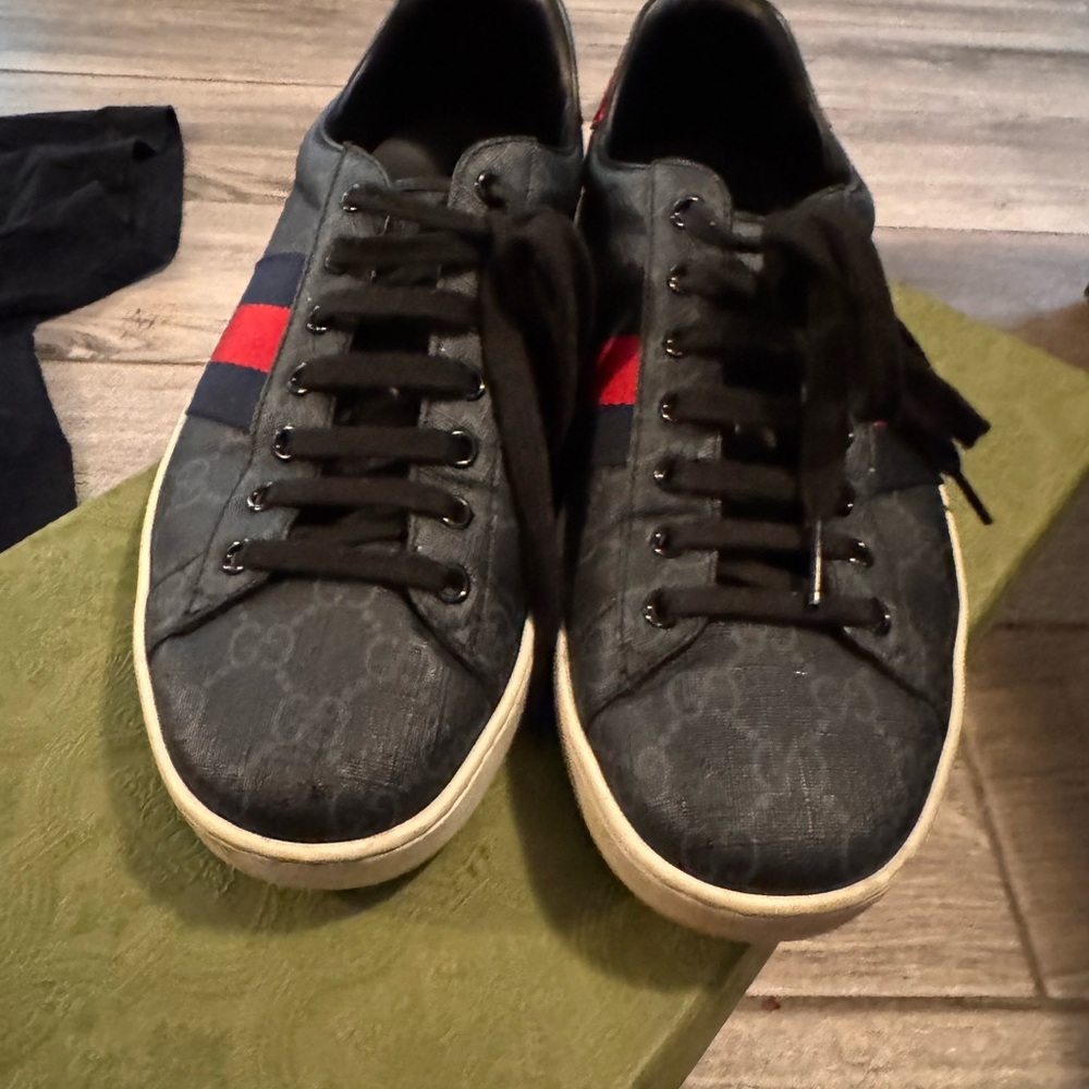 Gucci Red and Black Sneakers with Sleek Design